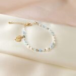 Bransoletka IT'S A BOY! z niebieskimi kamieniami Bransoletka IT'S A BOY! z niebieskimi kamieniami