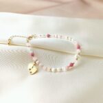 Bransoletka IT'S A GIRL! z różowymi kamieniami Bransoletka IT'S A GIRL! z różowymi kamieniami