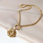 Łańcuch - blaszka z różą wiatrów Łańcuch - blaszka z różą wiatrów