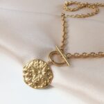 Łańcuch - blaszka z różą wiatrów Łańcuch - blaszka z różą wiatrów